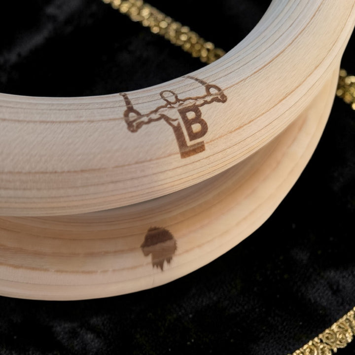 Wooden workout rings with custom laser engraving.