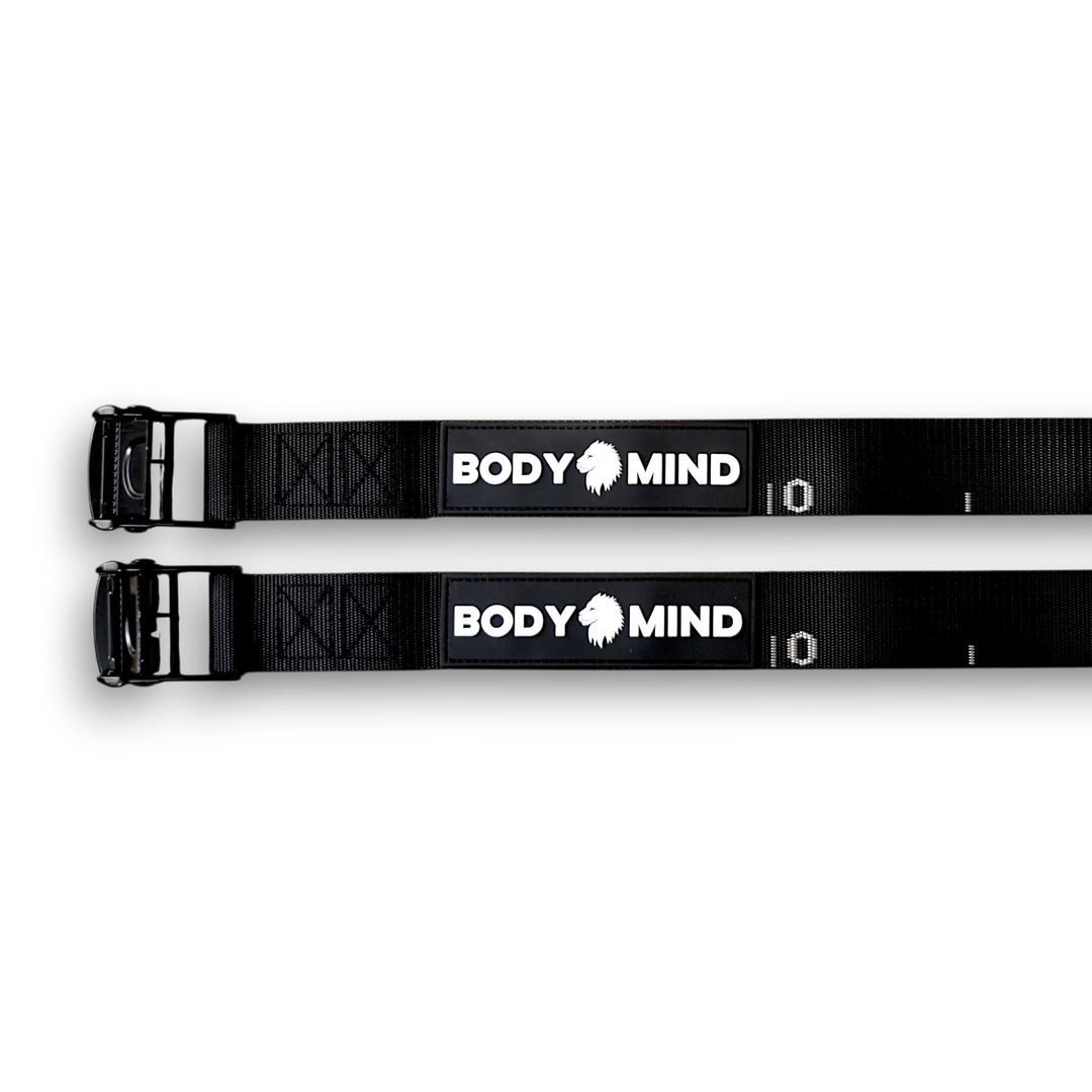 Two black straps with white scale and BODY and MIND logo