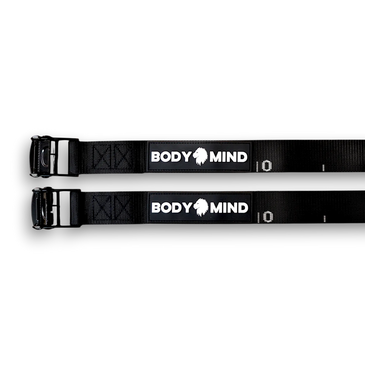 Two black straps with white scale and BODY and MIND logo