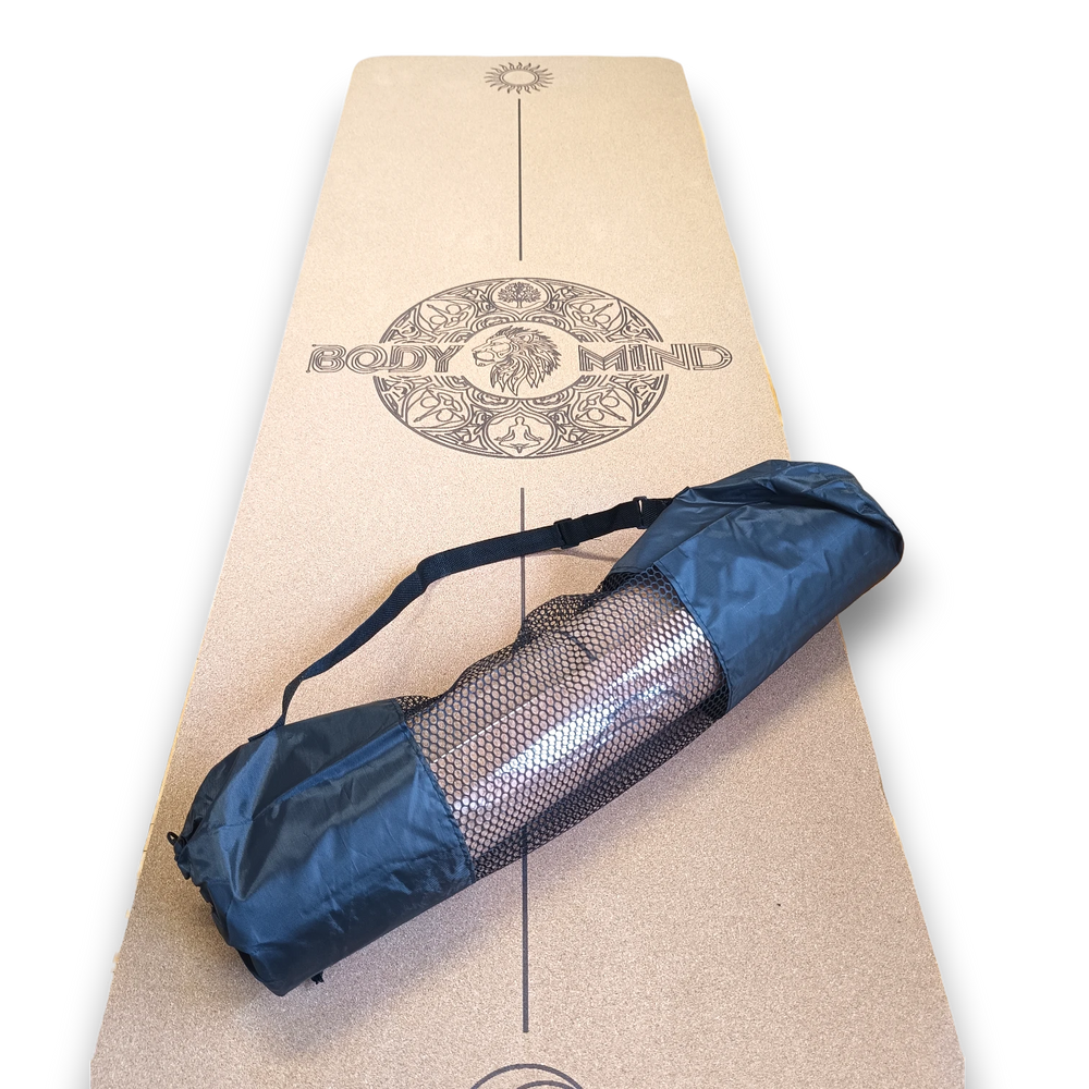 Yoga mat with a black carrying bag on top, featuring 'Body Mind' branding.
