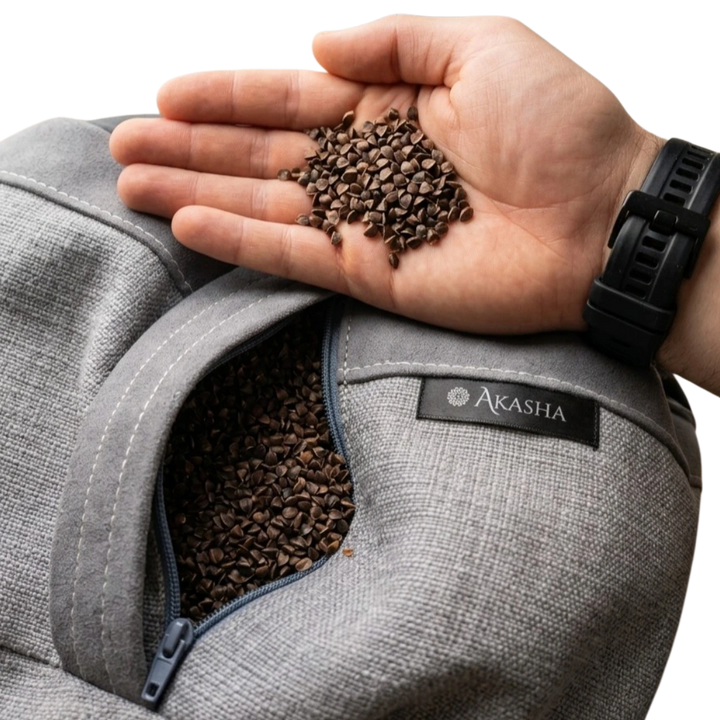 Close-up of 100% natural buckwheat hulls filling inside a vegan leather meditation cushion.