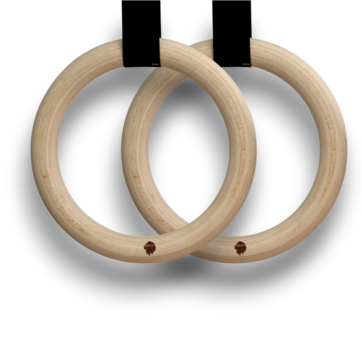 Two wooden gymnastic rings on a white background